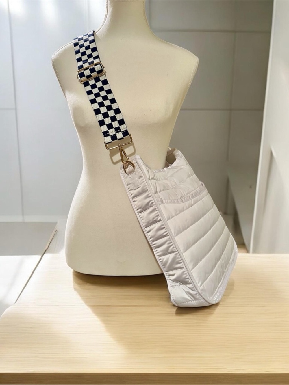 Ah Dorned White Quilted Crossbody Bag with Dark Navy Checkerboard Strap!